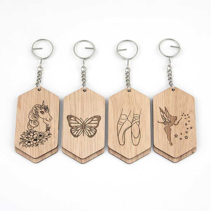 kids bag id tag made of wood with unicorn, butterfly, ballet shoes and a fairy etched on wood