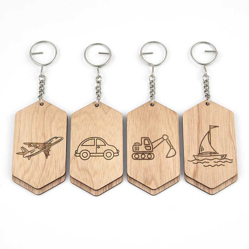 wooden bag id tags with plane, car, digger and sailboat etched