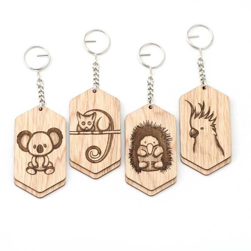 set of 4 bag tag next to each other with Australian animals etched on the front