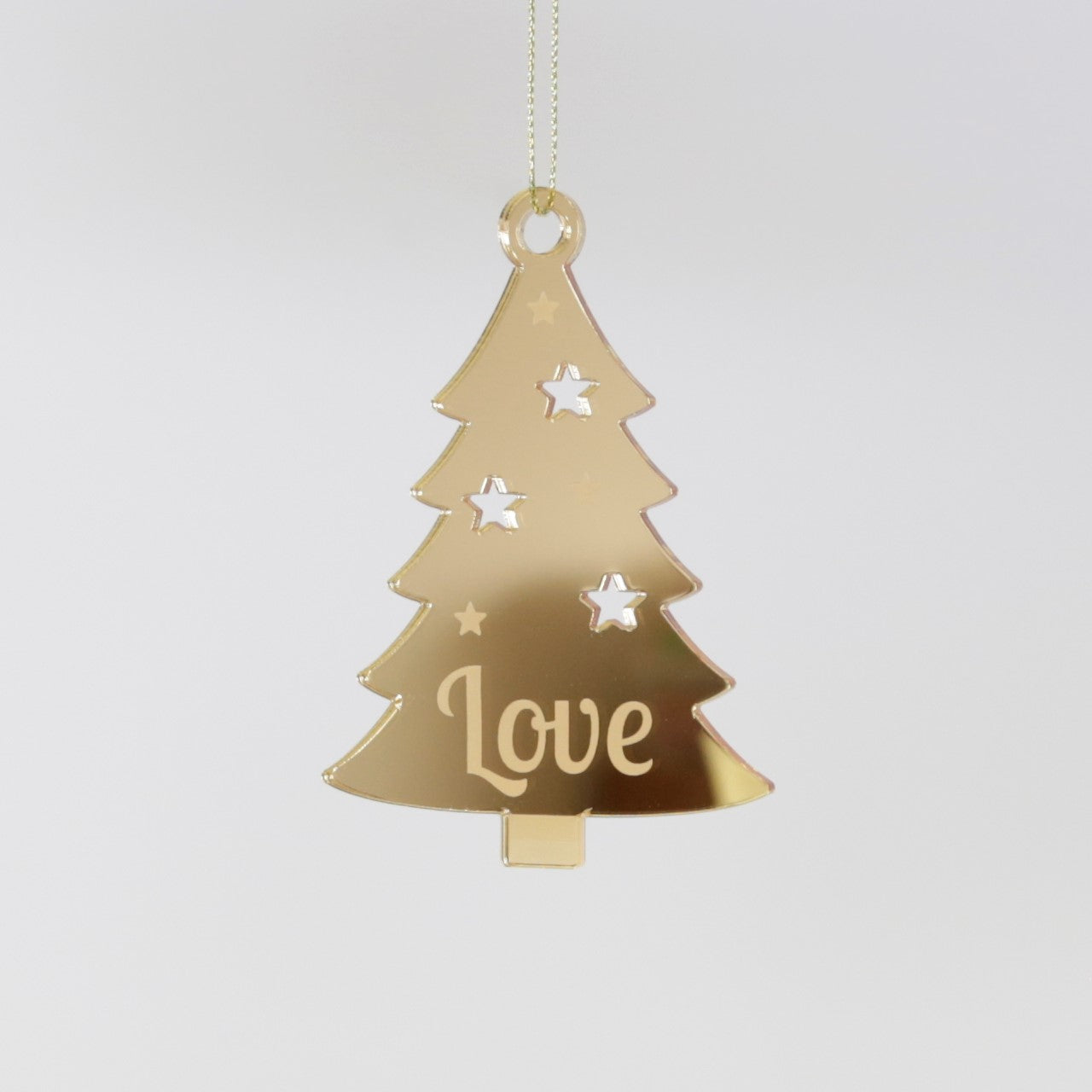 Gold mirror laser etched christmas ornament in the shape of a tree, says Love