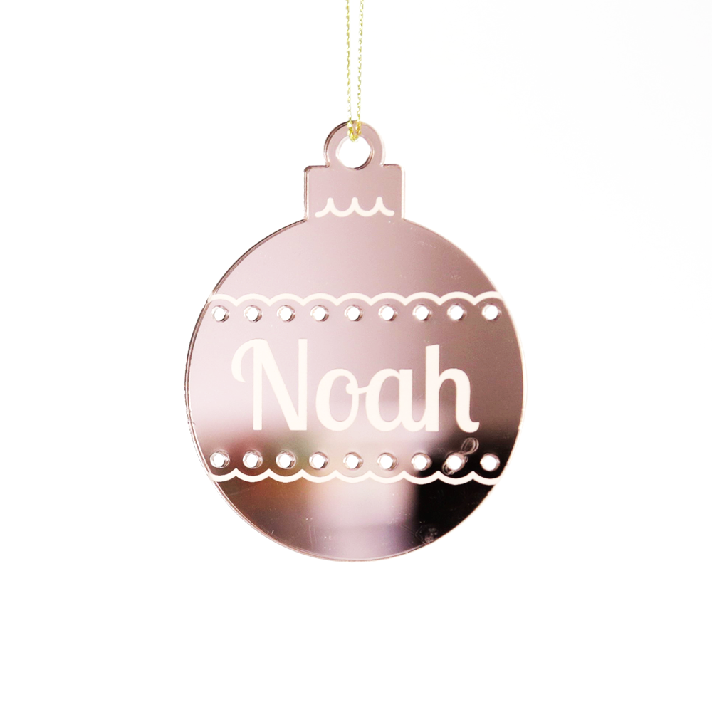Rose gold laser etched bauble ornament with the name Noah